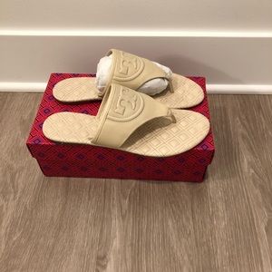 Tory Burch cream leather sandal.